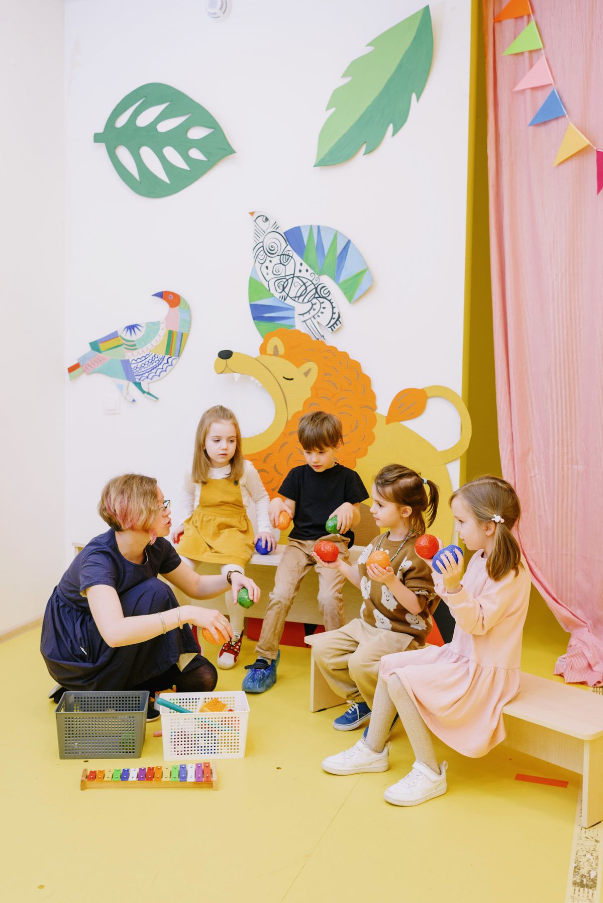 Small children doing a creative activity together